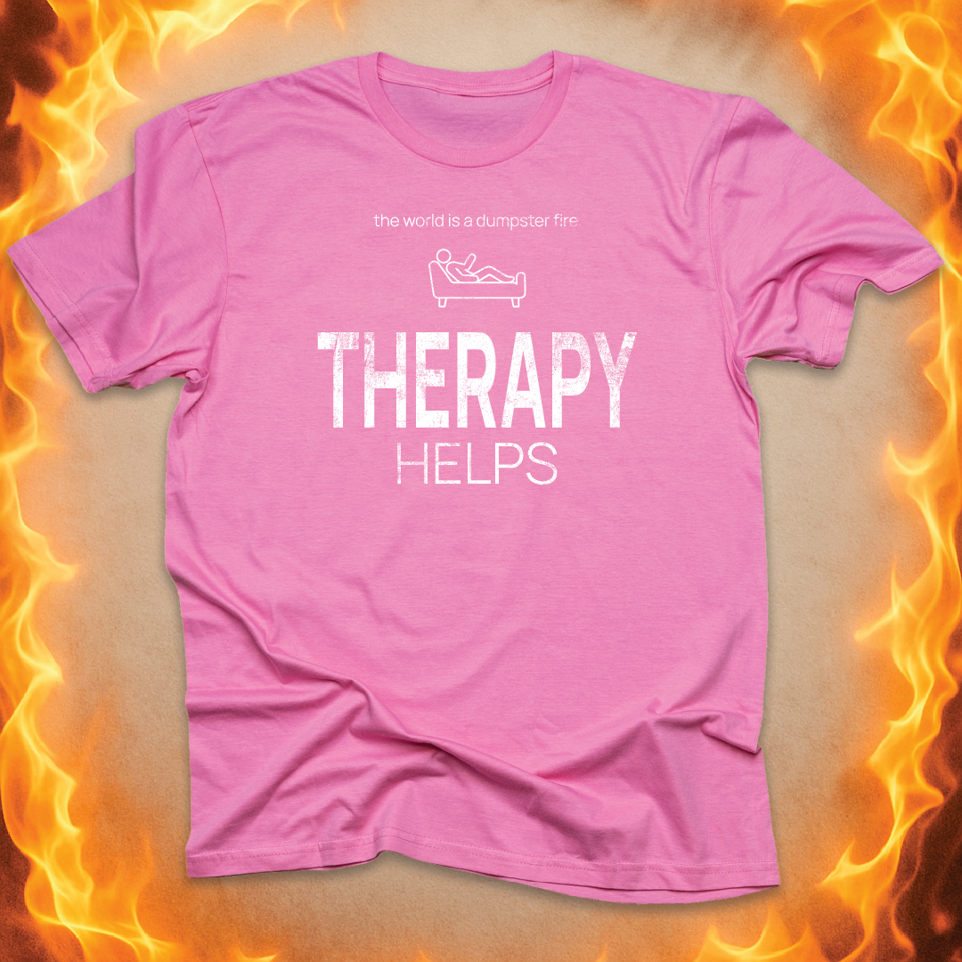 Minimalist line-art on the couch that says ‘THERAPY helps’ on a pink unisex t-shirt.